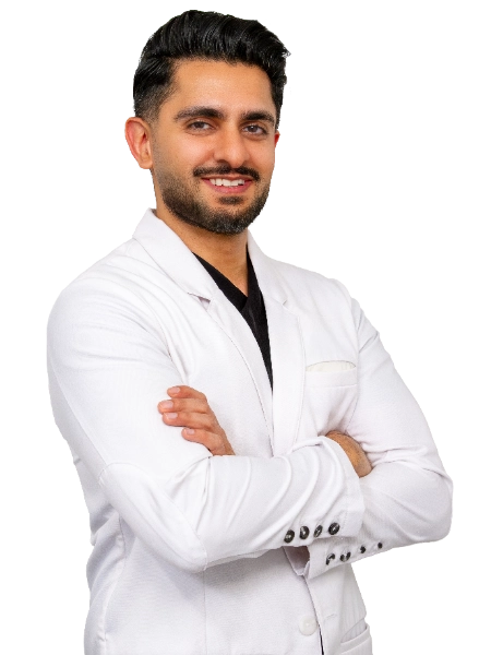 Professional headshot of Dr. Akash Mehta wearing a white lab coat, smiling at the camera against a black background. This is a standard medical professional portrait used for clinic or practice identification.